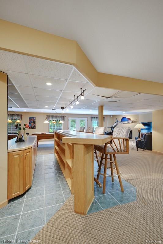 323 North Garner Road Milford, MI 48380 - Photo 44 of 56 Long bar downstairs