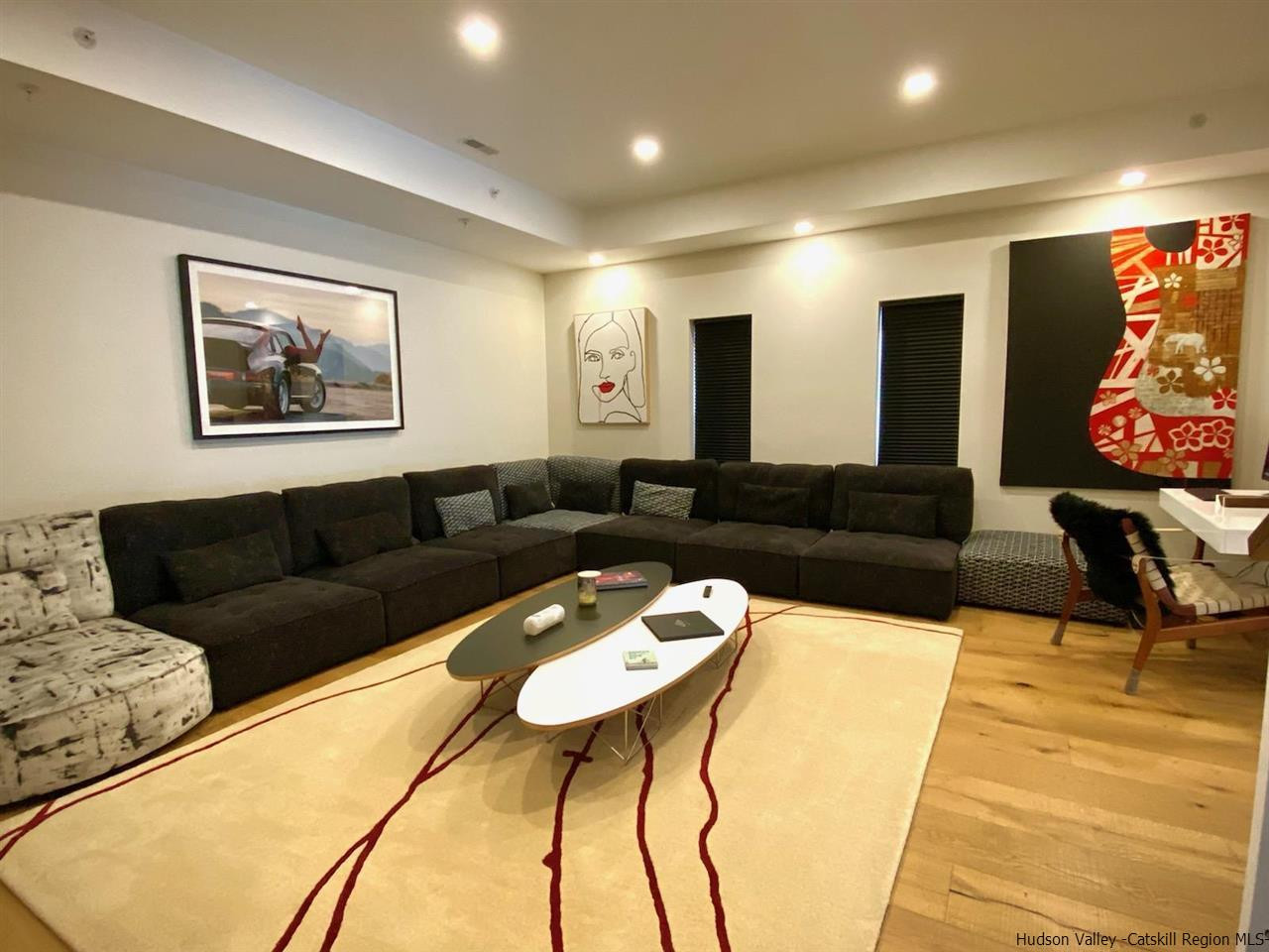 7717 Main Street Hunter, NY 12442 - Photo 12 of 32 a living room with furniture and kitchen view