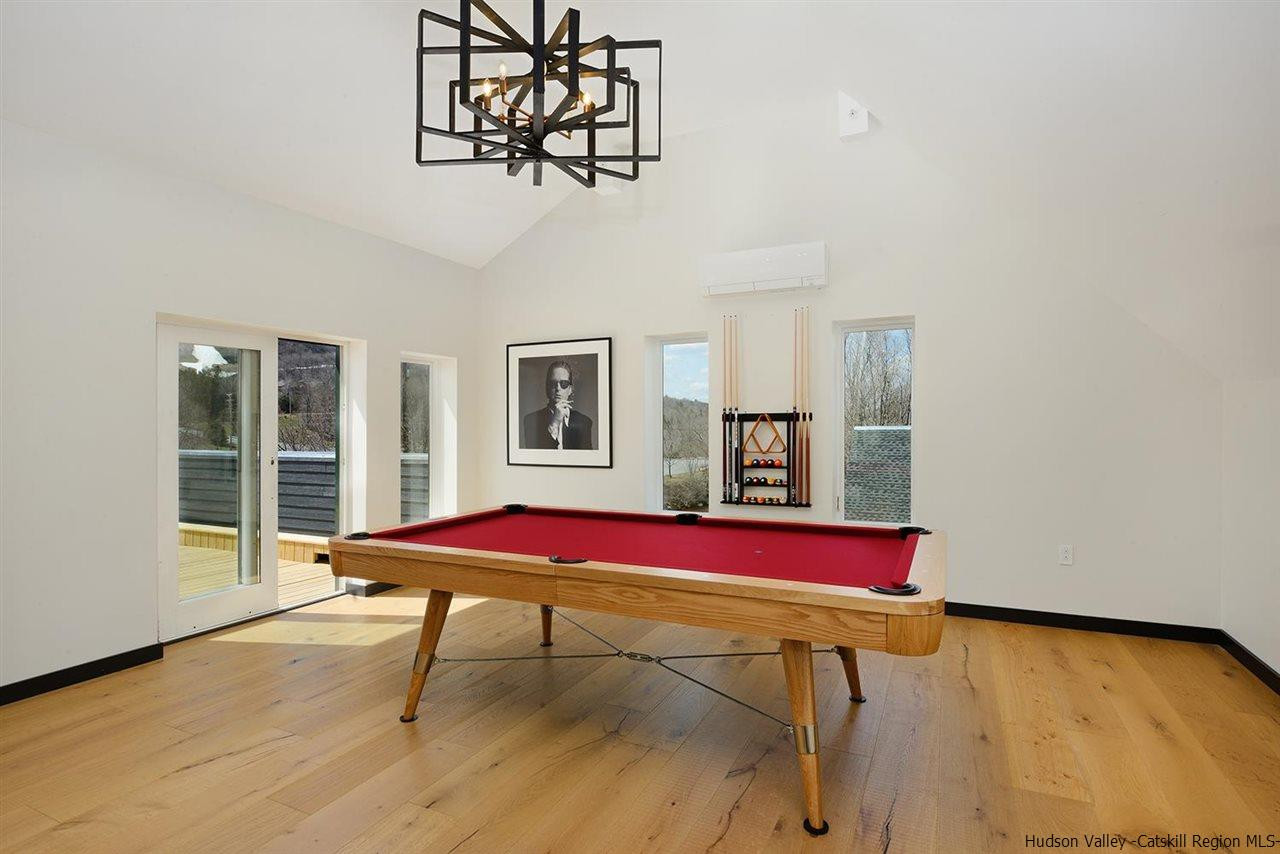 7717 Main Street Hunter, NY 12442 - Photo 14 of 32 a room with furniture pool table and windows