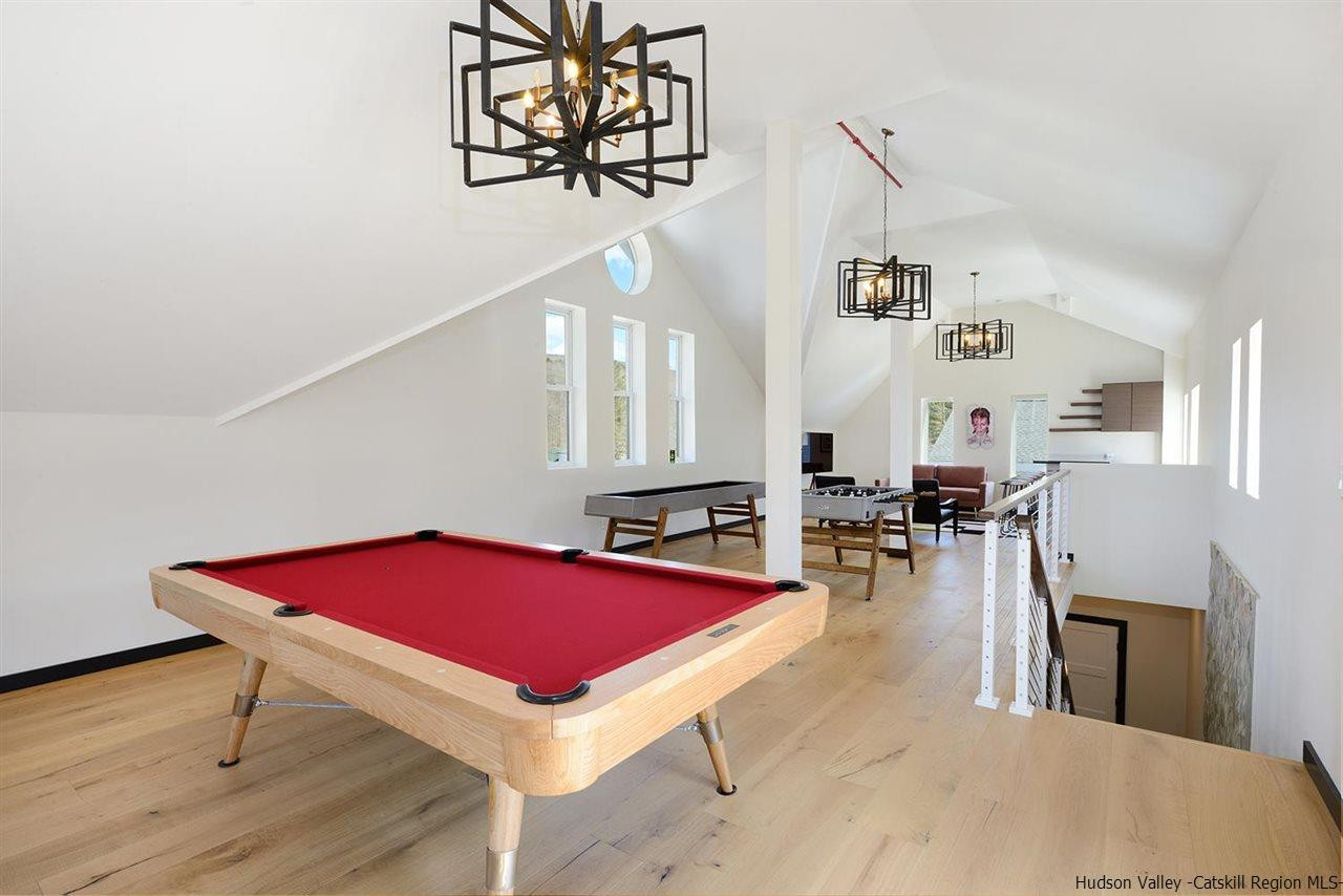 7717 Main Street Hunter, NY 12442 - Photo 15 of 32 a room with furniture pool table table and windows