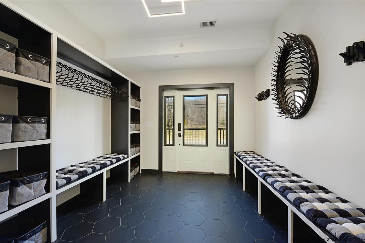 7717 Main Street Hunter, NY 12442 - Photo 18 of 32 a kitchen with a stove and a refrigerator