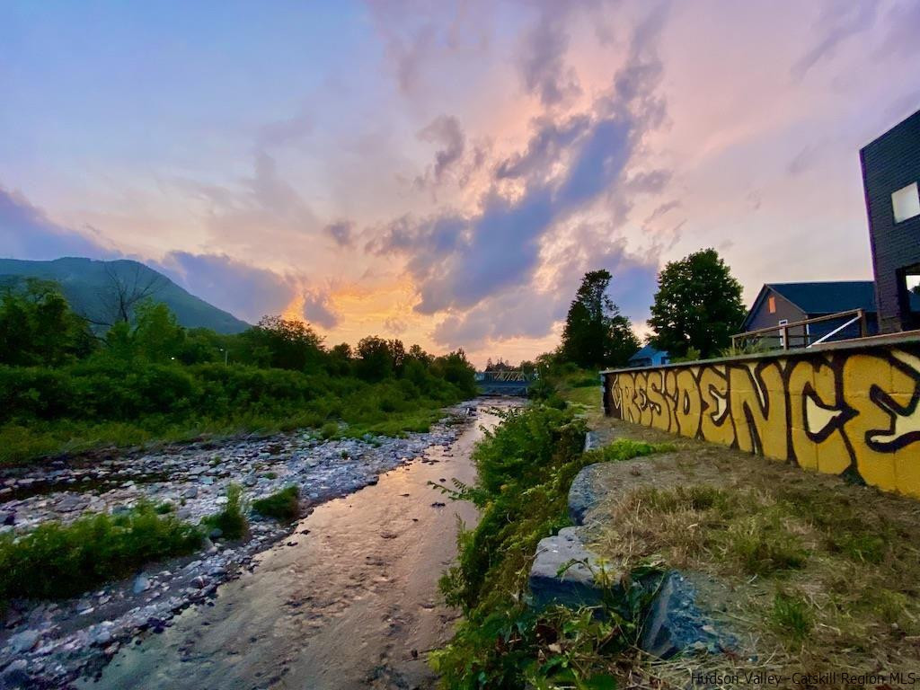 7717 Main Street Hunter, NY 12442 - Photo 6 of 32 a view of a street with a bench in the background