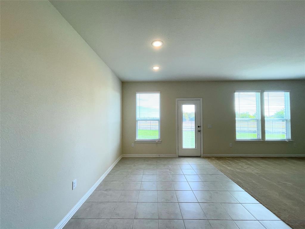 1805 Nelson Street Anna, TX 75409 - Photo 11 of 38 a view of an empty room with a window