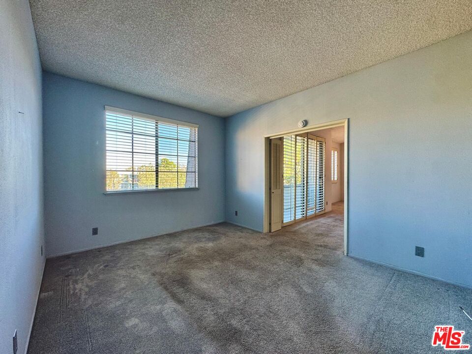 5100 Vía Dolce, Unit 305 Marina del Rey, CA 90292 - Photo 39 of 54 an empty room with windows