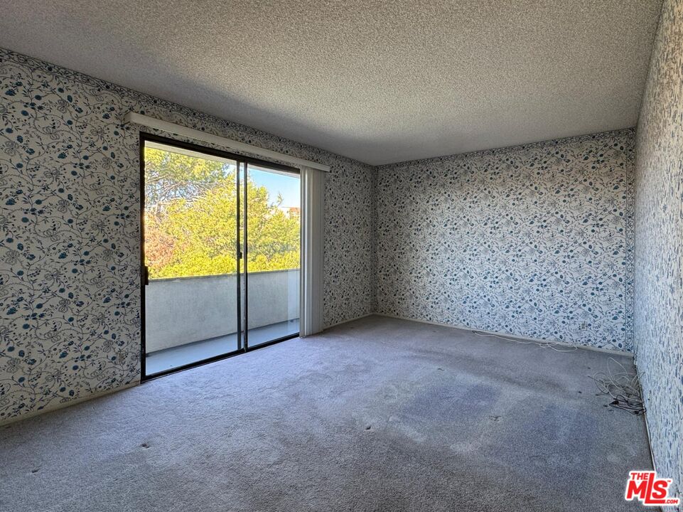 5100 Vía Dolce, Unit 305 Marina del Rey, CA 90292 - Photo 42 of 54 a view of an empty room with a window