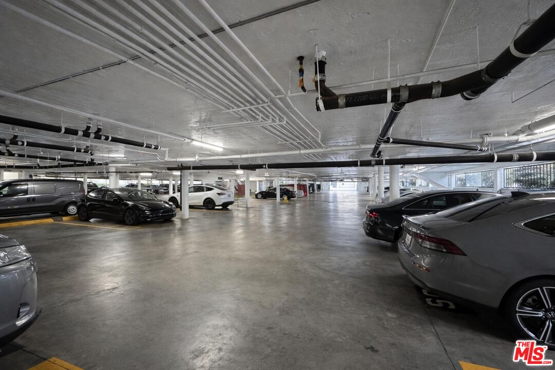 5100 Vía Dolce, Unit 305 Marina del Rey, CA 90292 - Photo 53 of 54 a view of a parking area