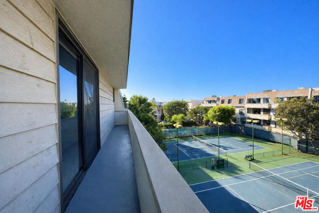 5100 Vía Dolce, Unit 305 Marina del Rey, CA 90292 - Photo 7 of 54 a view of a balcony with an outdoor space