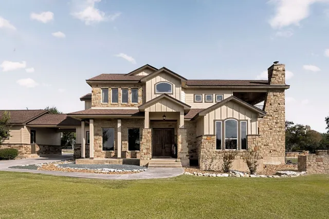 a view of a balcony with chairs