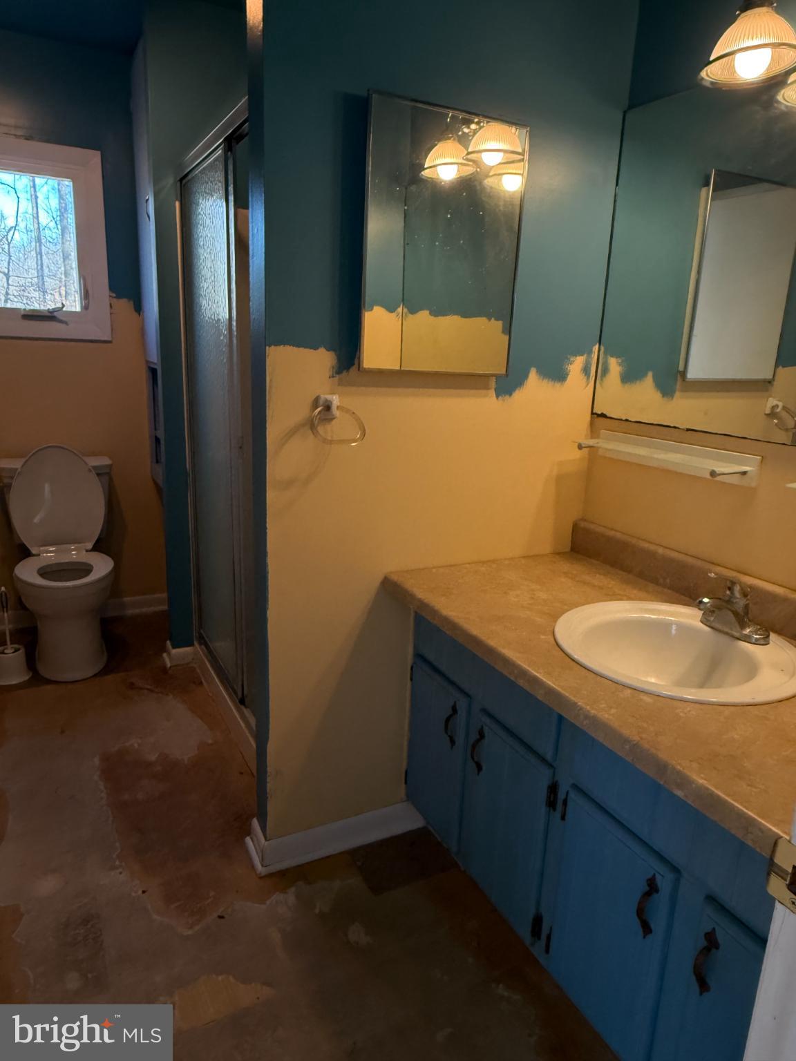 13528 John Kline Road Smithsburg, MD 21783 - Photo 17 of 21 a bathroom with a sink toilet and mirror