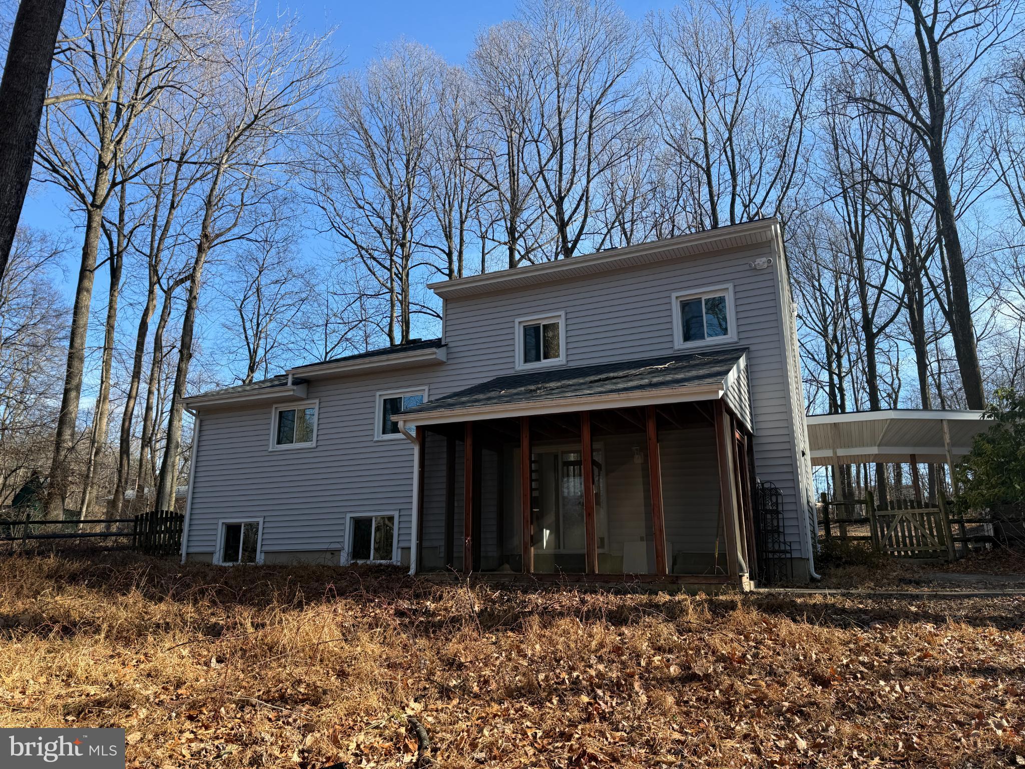 13528 John Kline Road Smithsburg, MD 21783 - Photo 4 of 21 a house with trees in front of it