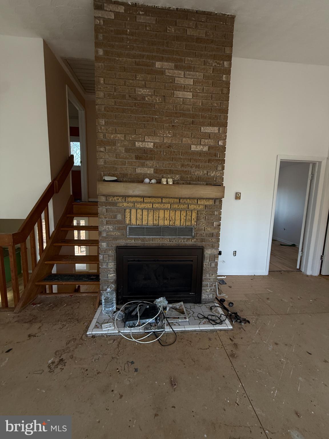 13528 John Kline Road Smithsburg, MD 21783 - Photo 10 of 21 a living room with furniture a fireplace and a flat screen tv