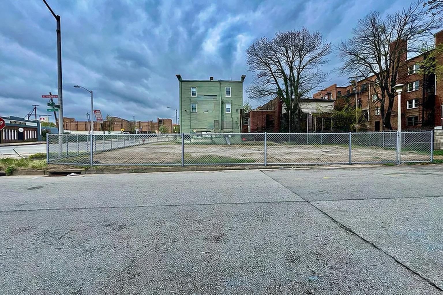 Vacant lot with urban backdrop with C1 Zoning