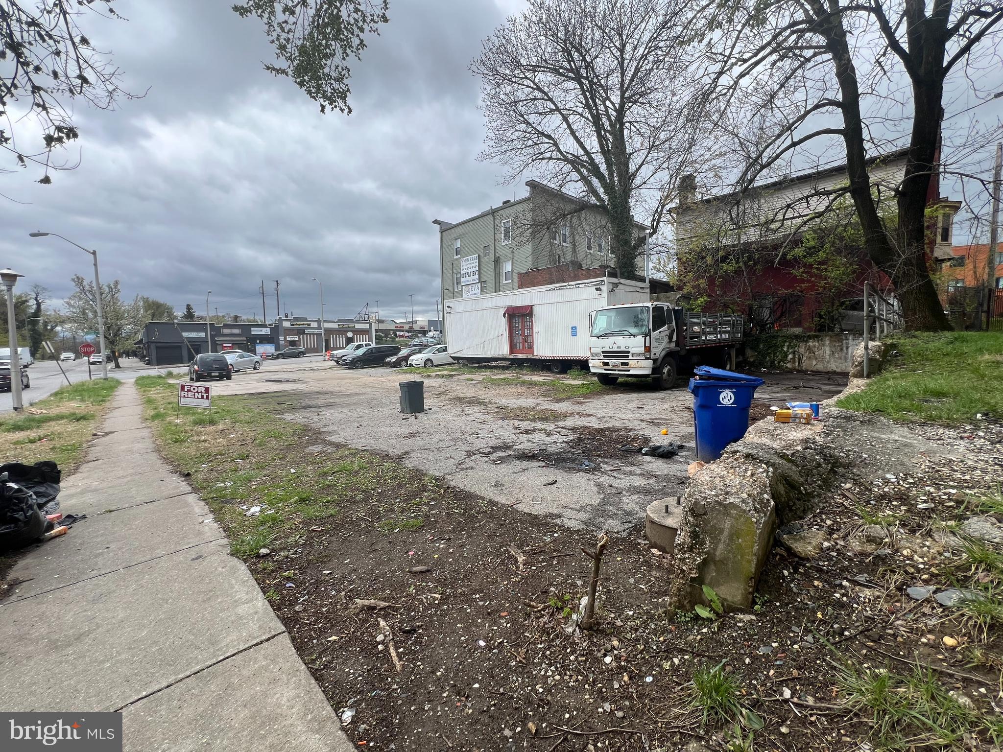 2100 Denison Street Baltimore, MD 21216 - Photo 2 of 3 a view of a yard with furniture