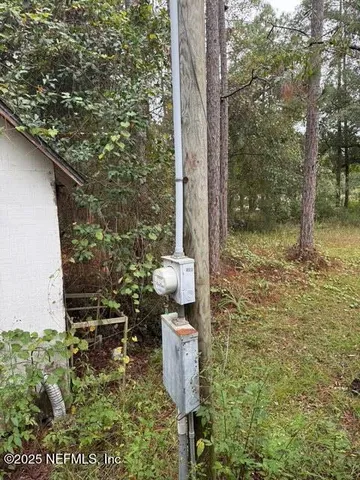 a backyard of a house with lots of green space