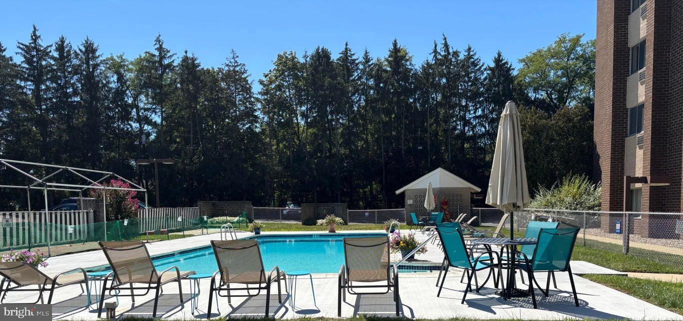 a view of an chairs and tables in the patio