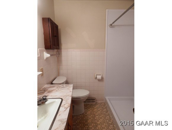 2246 Shutterlee Mill Road Staunton, VA 24401 - Photo 8 of 11 a bathroom with a toilet and a sink