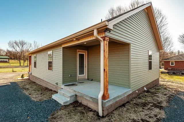 a view of a back yard of the house