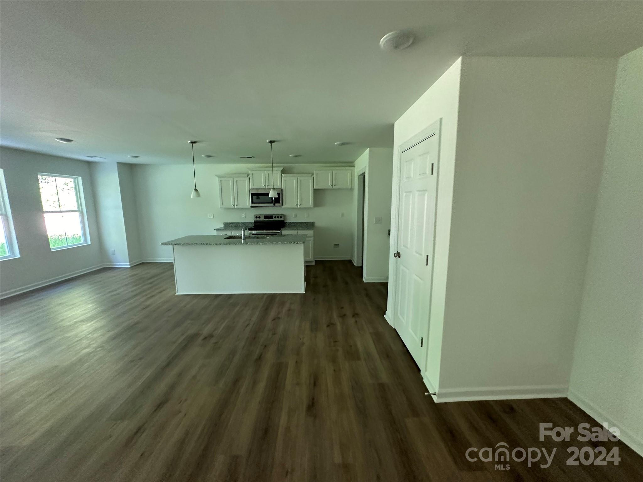 2433 Craig Farm Road Lancaster, SC 29720 - Photo 14 of 36 a view of a kitchen cabinets and wooden floor