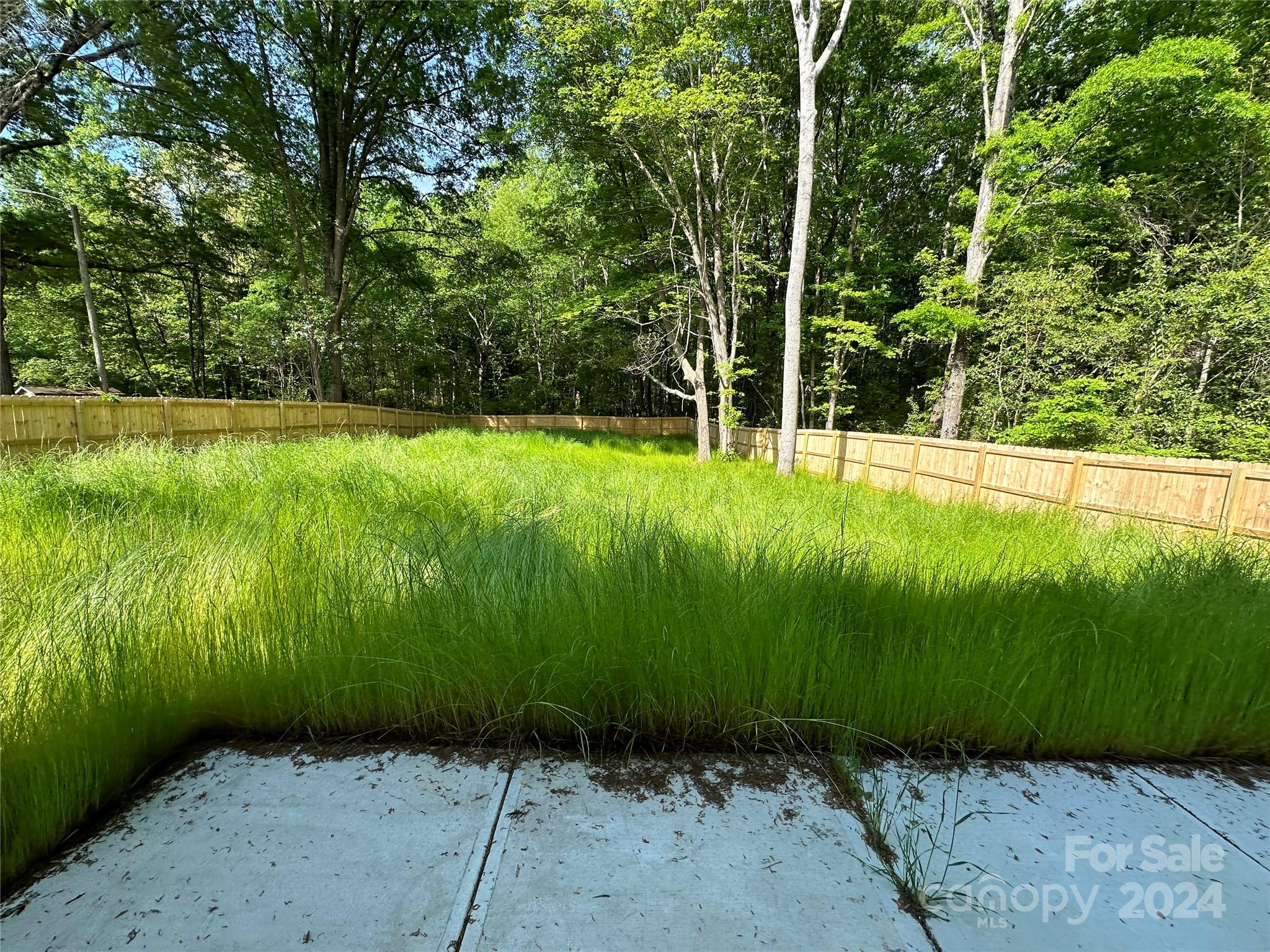 2433 Craig Farm Road Lancaster, SC 29720 - Photo 16 of 36 a view of a backyard with a garden
