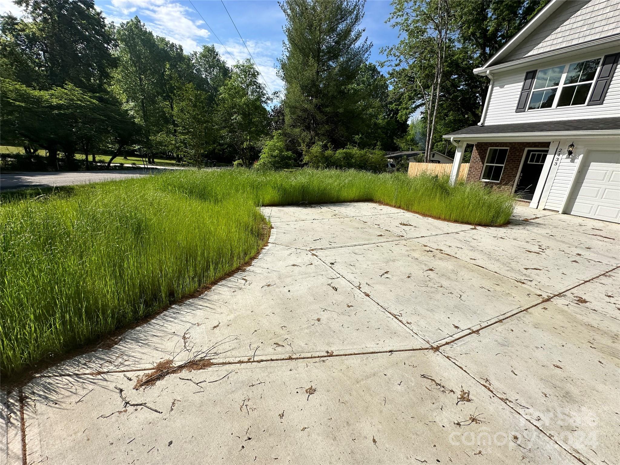 2433 Craig Farm Road Lancaster, SC 29720 - Photo 2 of 36 a view of a house with a yard