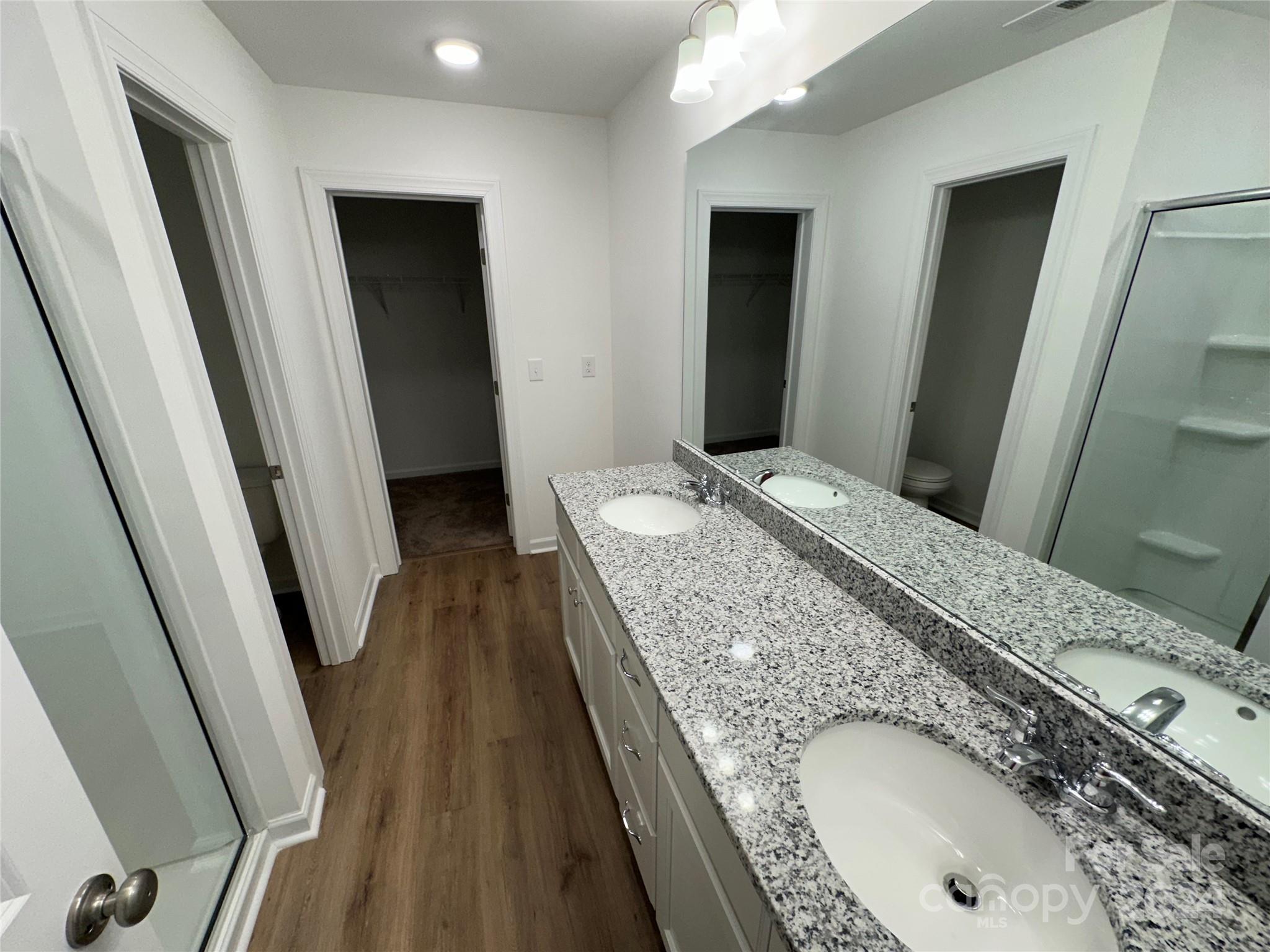 2433 Craig Farm Road Lancaster, SC 29720 - Photo 26 of 36 a en suite bathroom with a granite countertop sink