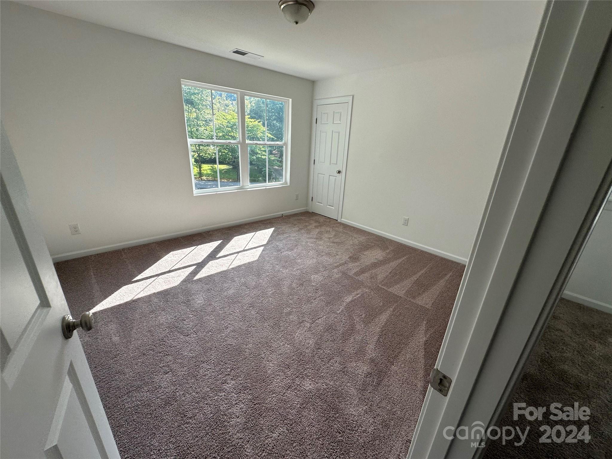 2433 Craig Farm Road Lancaster, SC 29720 - Photo 31 of 36 an empty room with windows