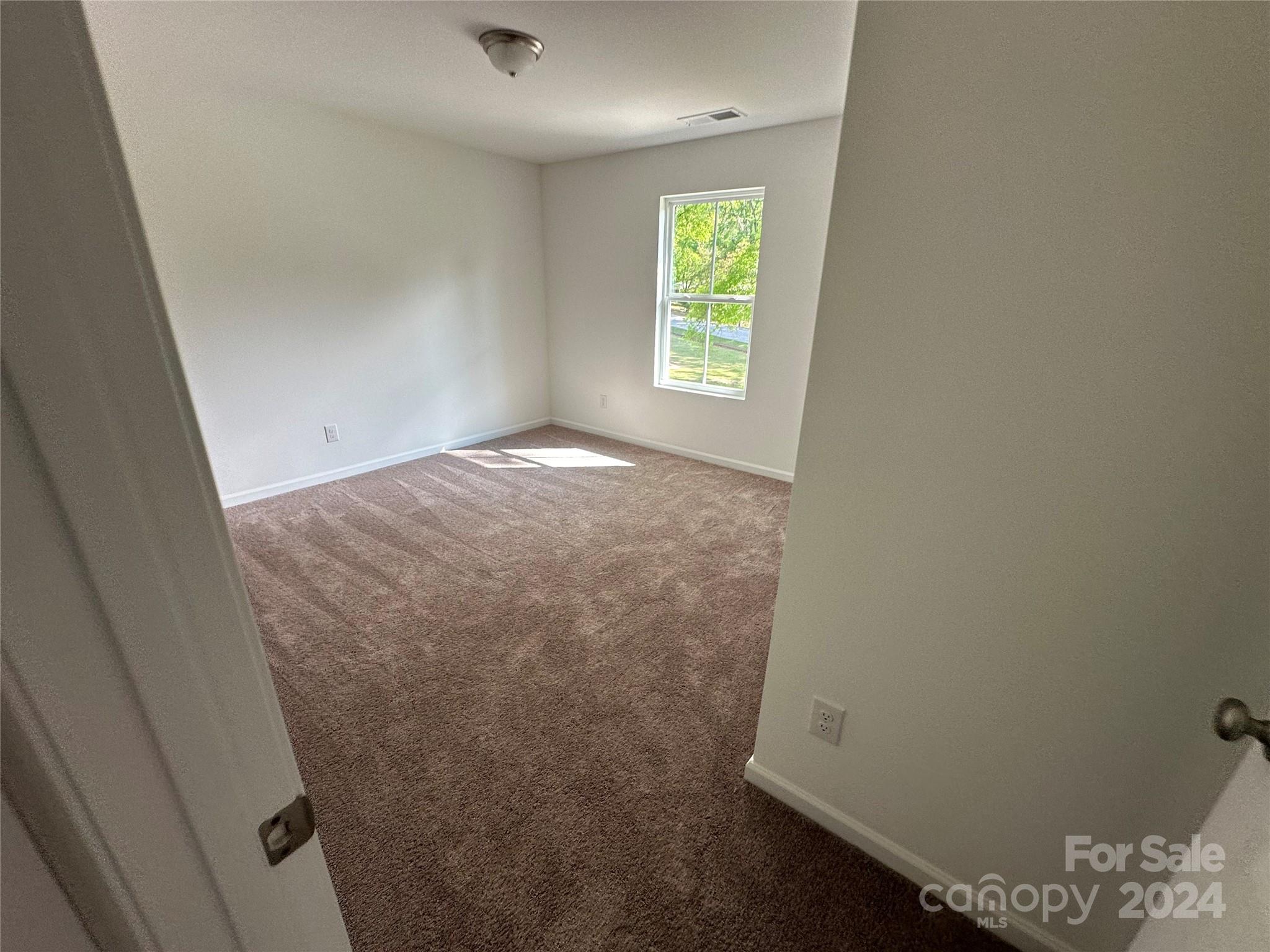2433 Craig Farm Road Lancaster, SC 29720 - Photo 32 of 36 an empty room with windows
