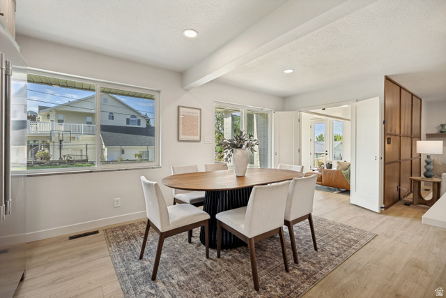 1168 East Center Street Bountiful, UT 84010 - Photo 13 of 38 Spacious dining area featuring wood-finish flooring, recessed lighting, and a large window