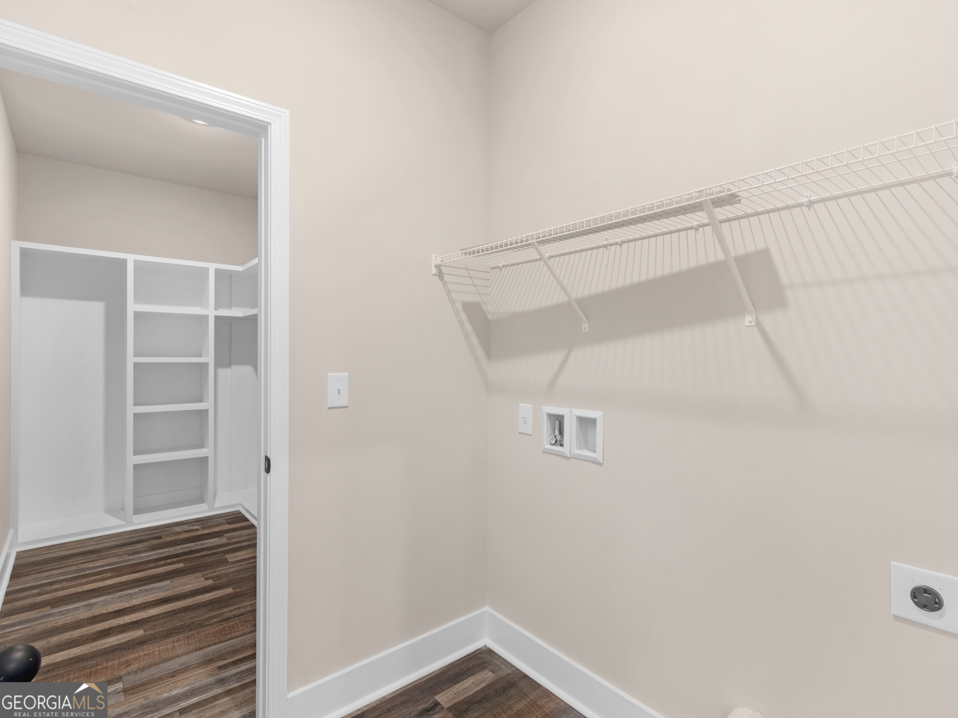160 Loyd Road Mansfield, GA 30056 - Photo 31 of 53 a view of walk in closet with empty racks