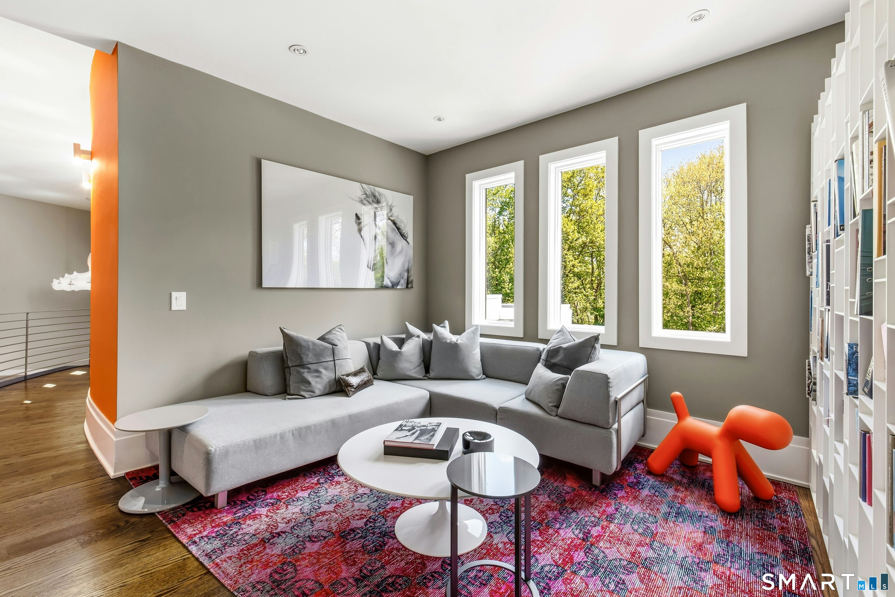 300 Sturges Ridge Road Wilton, CT 06897 - Photo 24 of 40 a living room with furniture and a large window
