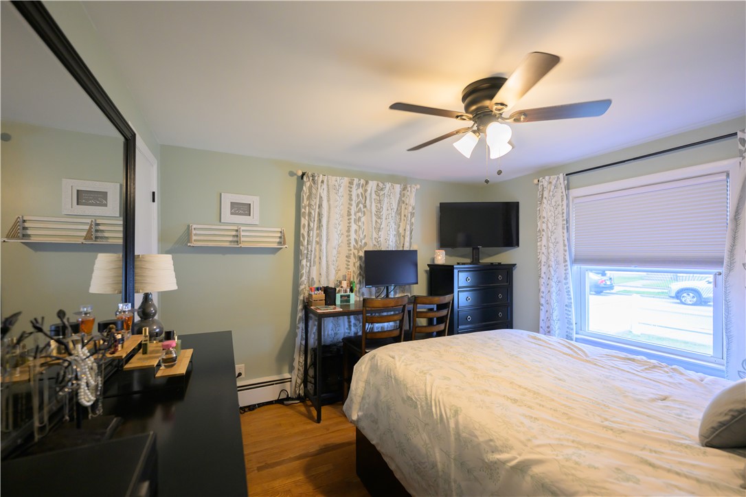 220 Shawmut Avenue Central Falls, RI 02863 - Photo 14 of 25 Bedroom 2, hardwood floors on 1st level.