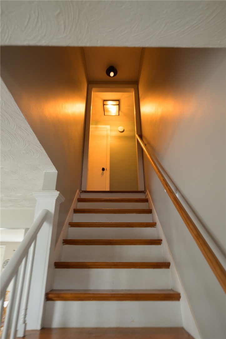 220 Shawmut Avenue Central Falls, RI 02863 - Photo 15 of 25 Stairs leading up to the additional 2 bedrooms.