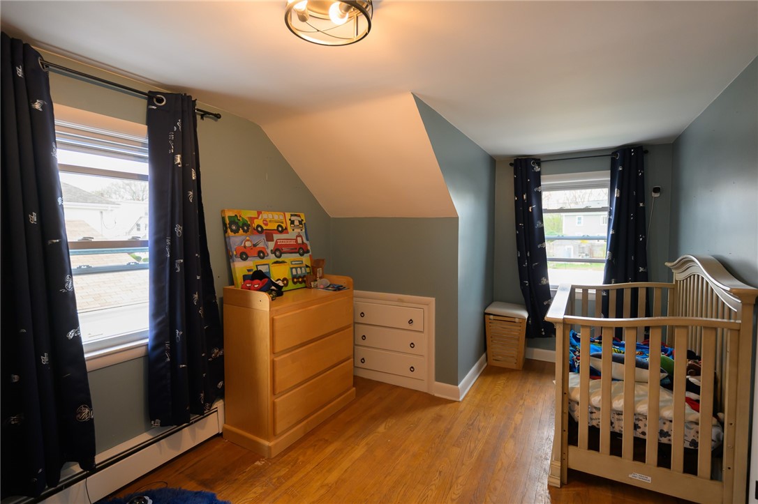 220 Shawmut Avenue Central Falls, RI 02863 - Photo 19 of 25 Bedroom #4, located on 2nd level. Two windows to let the sunshine in.