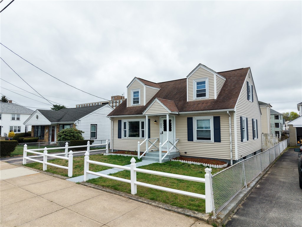 220 Shawmut Avenue Central Falls, RI 02863 - Photo 2 of 25 Another view of the front of this home, effortless curb appeal.