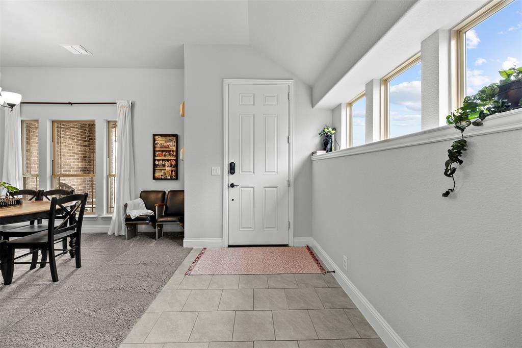 1084 Imperial Eagle Road Alvarado, TX 76009 - Photo 6 of 39 a view of a livingroom with furniture and windows
