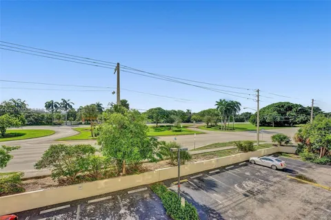 a view of a yard with an ocean view