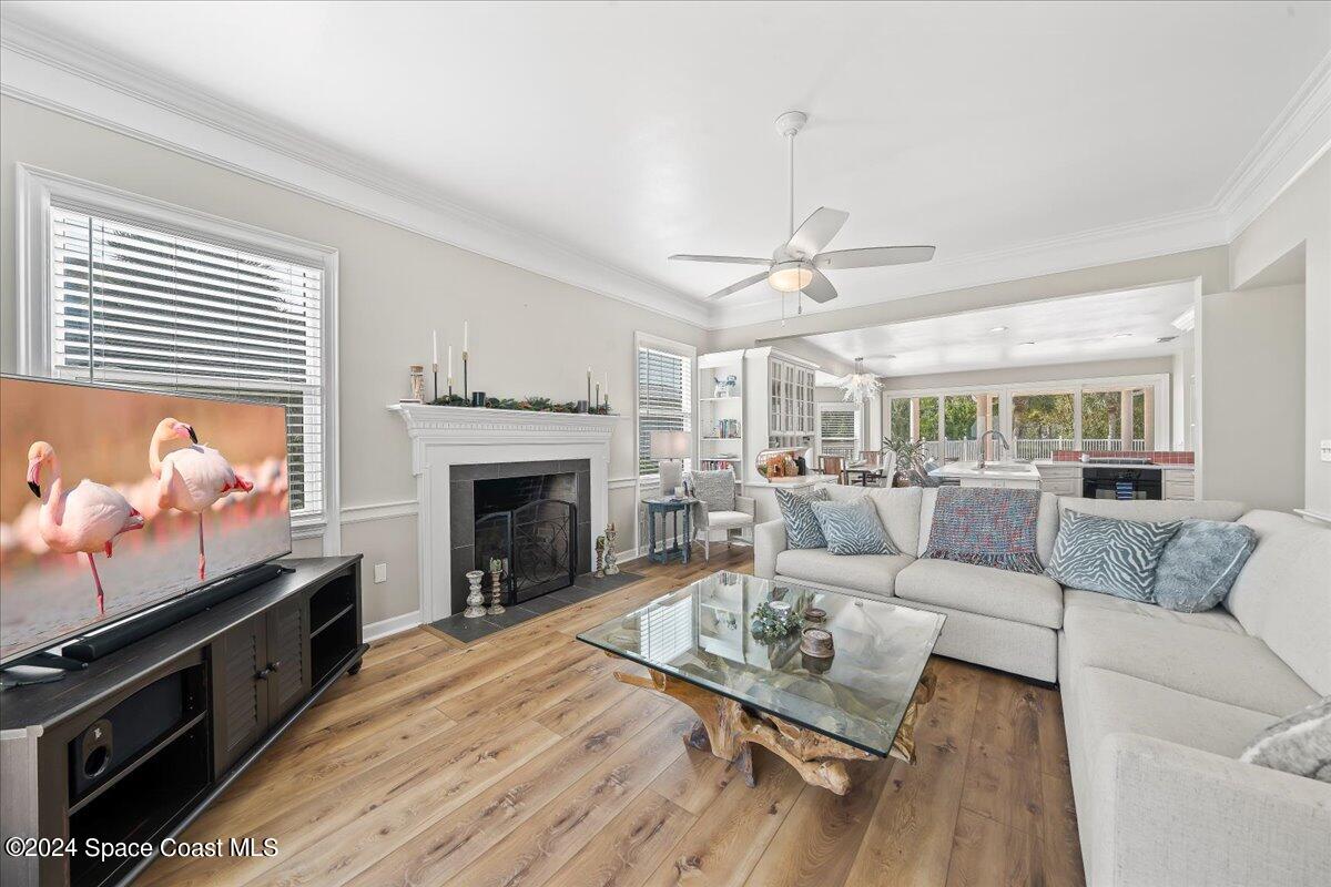 2420 Rocky Point Road Malabar, FL 32950 - Photo 28 of 97 Family room with fireplace