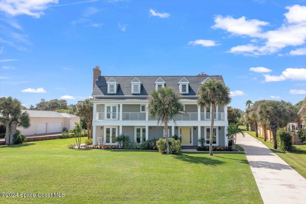 2420 Rocky Point Road Malabar, FL 32950 - Photo 3 of 97 a view of a building with garden