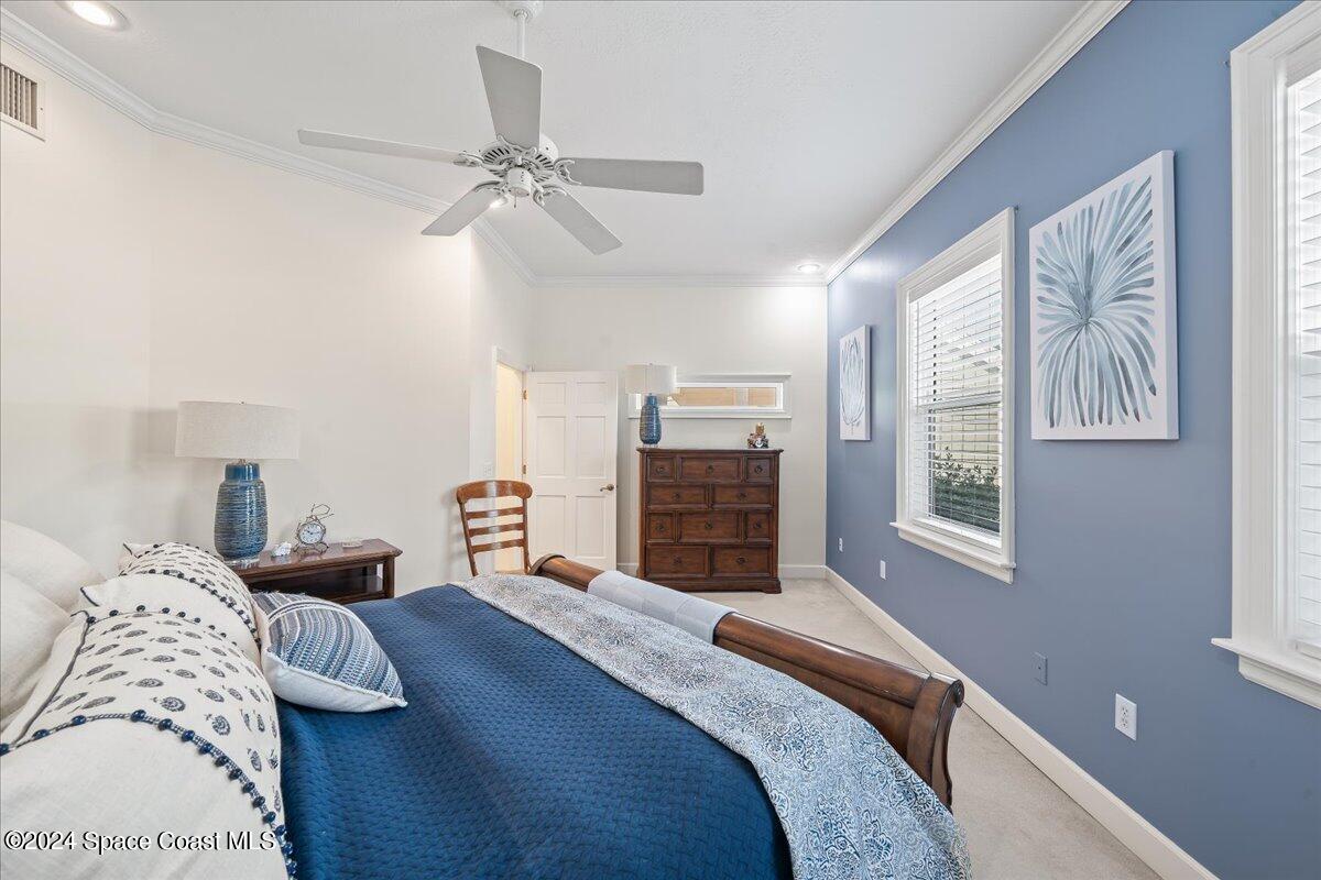 2420 Rocky Point Road Malabar, FL 32950 - Photo 40 of 97 a bedroom with bed and a window