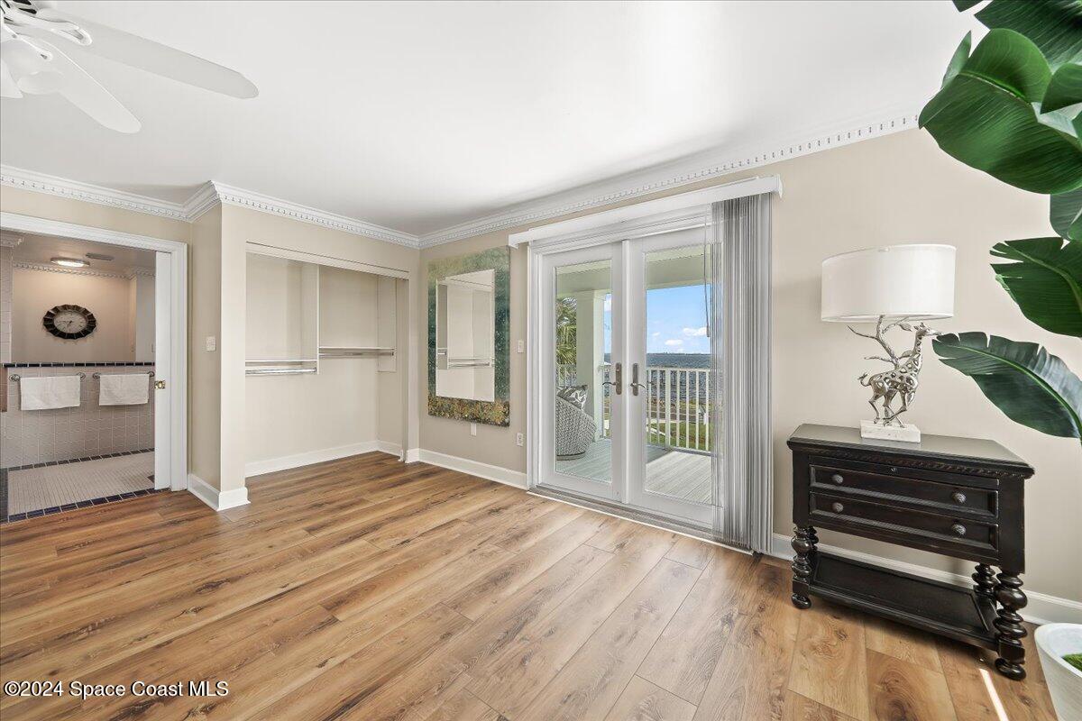 2420 Rocky Point Road Malabar, FL 32950 - Photo 47 of 97 a view of empty room with wooden floor