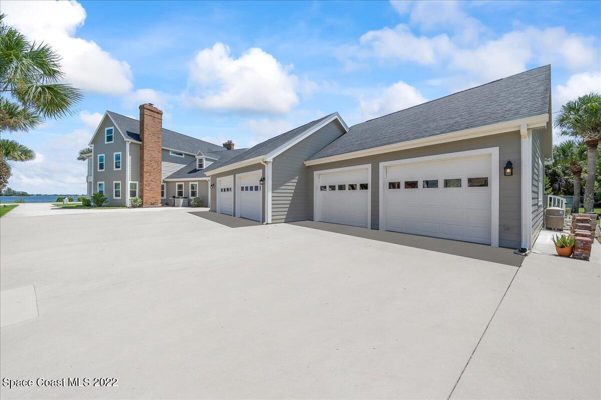 2420 Rocky Point Road Malabar, FL 32950 - Photo 6 of 97 4 car garage