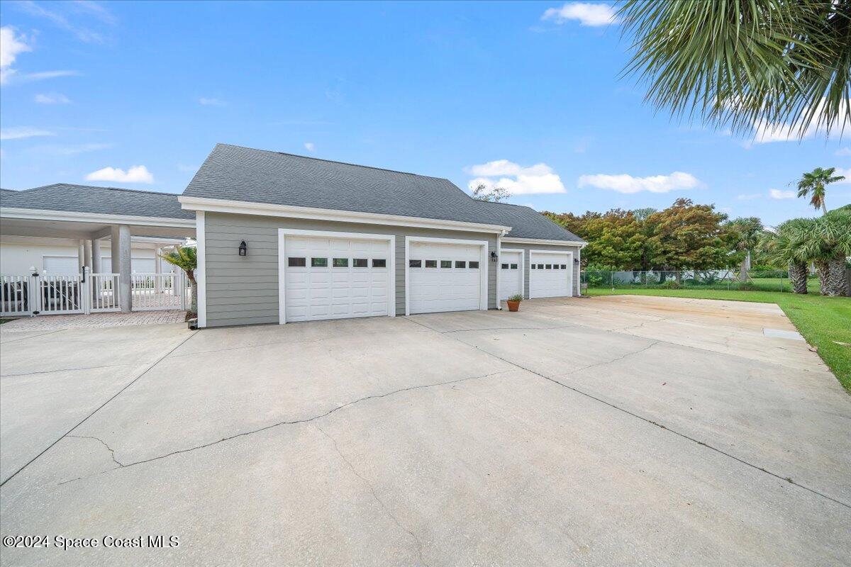 2420 Rocky Point Road Malabar, FL 32950 - Photo 7 of 97 4 car garage