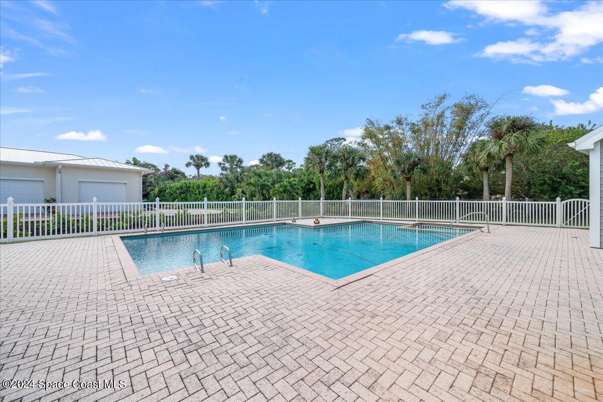 2420 Rocky Point Road Malabar, FL 32950 - Photo 73 of 97 a view of a swimming pool with a lake view
