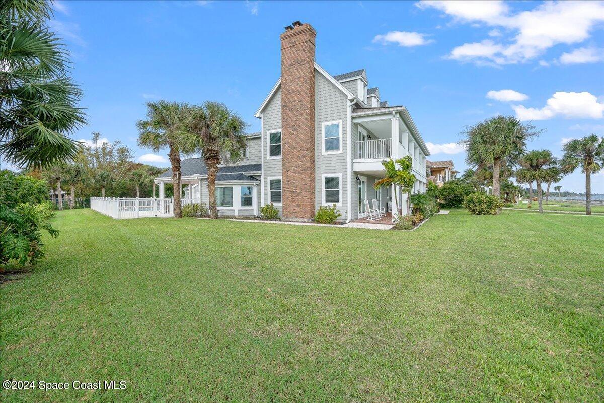 2420 Rocky Point Road Malabar, FL 32950 - Photo 76 of 97 a view of a house with a yard
