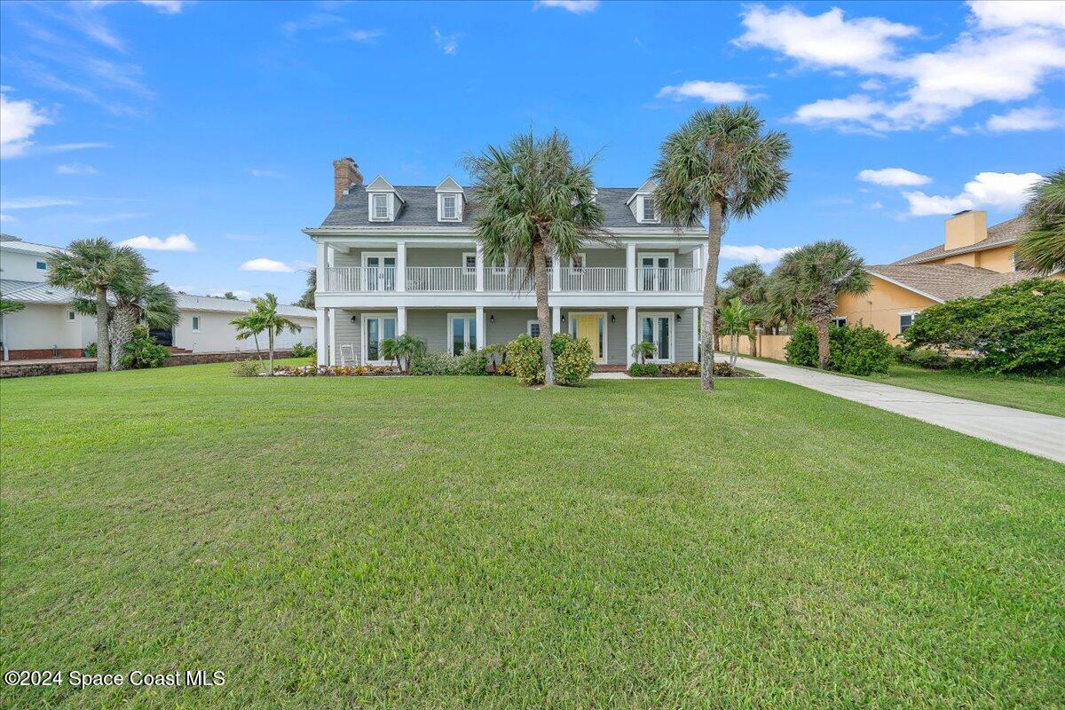 2420 Rocky Point Road Malabar, FL 32950 - Photo 78 of 97 a view of house with yard