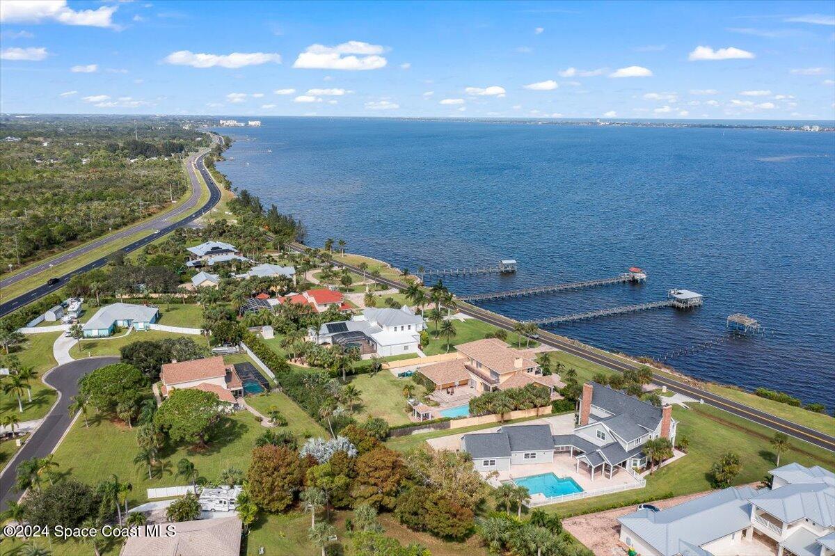 2420 Rocky Point Road Malabar, FL 32950 - Photo 82 of 97 an aerial view of residential houses with outdoor space