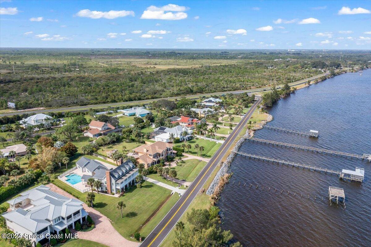 2420 Rocky Point Road Malabar, FL 32950 - Photo 83 of 97 an aerial view of residential houses with outdoor space