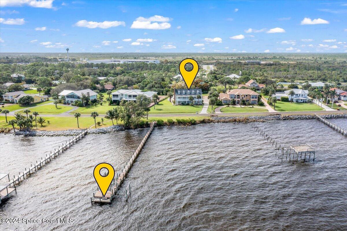 2420 Rocky Point Road Malabar, FL 32950 - Photo 95 of 97 a view of a swimming pool with a seating space