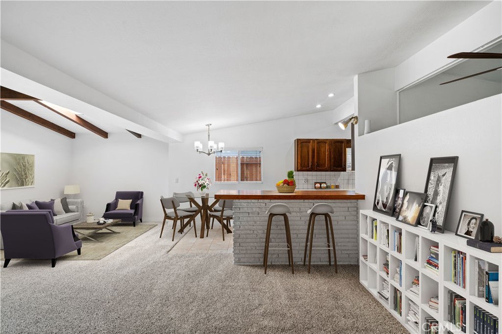 2115 Sterling Avenue Costa Mesa, CA 92627 - Photo 12 of 53 a view of a livingroom with furniture and flat screen tv