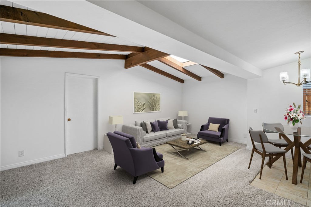 2115 Sterling Avenue Costa Mesa, CA 92627 - Photo 16 of 53 a living room with furniture and a wooden floor